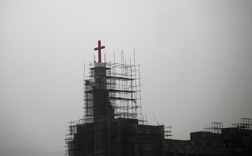 The local government in Zhejiang issued a regulation earlier this year regarding the display of crosses on church roofs.