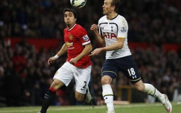 Manchester United's Rafael da Silva (L) in action with Tottenham Hotspur's Harry Kane last season.