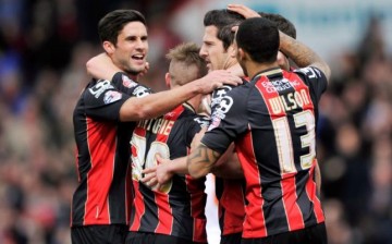Bournemouth's Yann Kermorgant celebrates scoring their first goal with teammates during a match against Middlesbrough in the Sky Bet Championship last March.