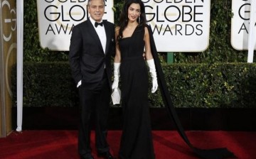 Actor George Clooney and his wife Amal Clooney arrive at the 72nd Golden Globe Awards in Beverly Hills, California January 11, 2015.