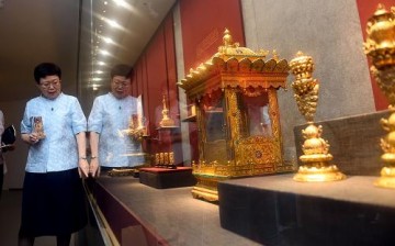 Fung Ming-Chu, director of Taipei's National Palace Museum, visits the Beijing Palace Museum's branch at the Olympic Park Observation Tower on Aug. 11, 2015. 
