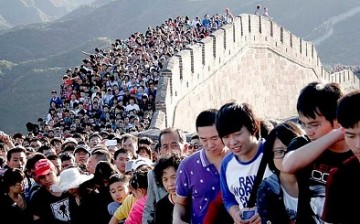 The Chinese government is urging employers, including government agencies, to make Friday a half day so their employees will have longer vacation time.