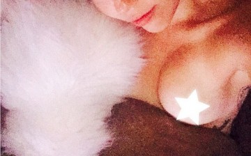 Miley Cyrus Shares Topless Pic To Wish Her Fans Goodnight