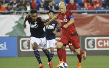 Toronto team captain and midfielder Michael Bradley (R)