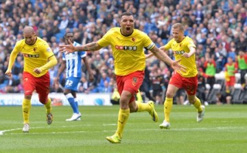 Watford striker Troy Deeney (middle) celebrates a goal.