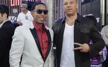 Cast member Chris ''Ludacris'' Bridges (L) poses with producer and cast member Vin Diesel during the premiere of their new film ''Fast & Furious 6''