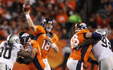 Denver Broncos quarterback Peyton Manning (#18)