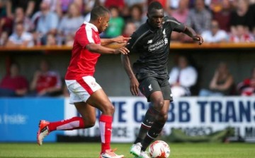 Liverpool striker Christian Benteke (R)