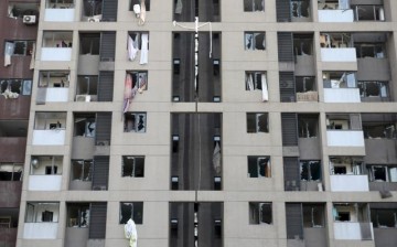 Apartment windows shattered by the blasts in Tianjin.