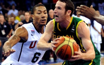 Brazilian point guard Marcelo Huertas (R) against Team USA's Derrick Rose.