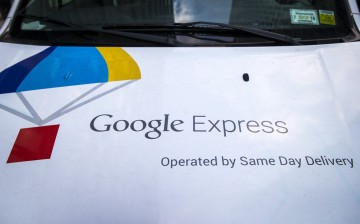 The Google Express logo is seen on one of its delivery trucks parked in New York. According to reports, Google plans to return to China with a new App Store.