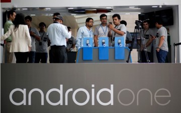 Visitors look at Android One Based mobiles