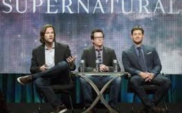 Cast member Jared Padalecki (L) speaks next to writer Jeremy Carver (C) and co-star Jensen Ackles at a panel for The CW television series 