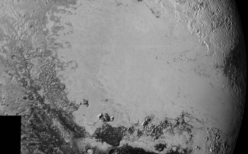 Mosaic of high-resolution images of Pluto, sent back from NASA’s New Horizons spacecraft from Sept. 5 to 7, 2015. The image is dominated by the informally-named icy plain Sputnik Planum, the smooth, bright region across the center.
