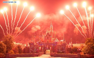 A firework show is held at the Hong Kong Disneyland in Hong Kong, south China, Sept. 11, 2015. Hong Kong Disneyland held a celebration for its 10th anniversary on Friday.