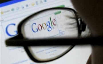 A Google search page is seen through the spectacles of a computer user in Leicester, central England July 20, 2007.