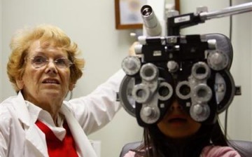 Eye Doctor Tests Child's Vision