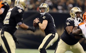 New Orleans Saints quarterback Drew Brees (middle).