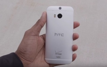 A user checks out an HTC smartphone.