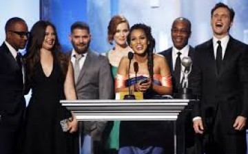 Actress Kerry Washington (C) and the cast and crew of 