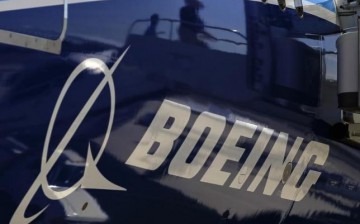 The Boeing logo is seen on a Boeing 787 Dreamliner airplane in Long Beach, California, March 14, 2012.
