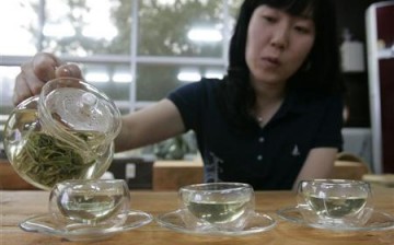 Woman Making Green Tea