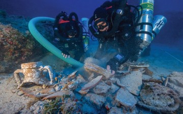 Divers check out the treasures and artifacts from the wreckage of a merchant ship that sank in the tiny Greek island of Antikythera; some of them are showcased at the Antikenmuseum Basel. 