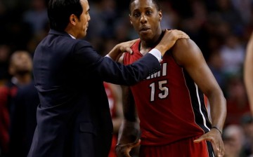 Miami Heat point guard Mario Chalmers (R) with head coach Eric Spoelstra.