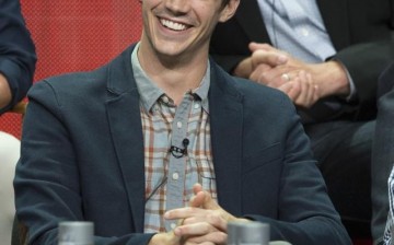 Cast member Grant Gustin attends a panel for The CW television series 