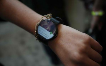 A representative presents a Motorola Moto 360 watch is seen during the Google I/O Developers Conference at Moscone Center on June 25, 2014 in San Francisco, California.