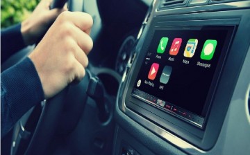 A car's dashboard showing apps featured by Android Auto.