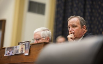 Congressman Jeff Duncan at his seat with pictures of the four Americans imprisoned in Iran during a House Committee on Foreign Affairs hearing on President Obamas nuclear agreement with Iran in Washington, USA on July 28, 2015.