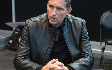 Actor Jim Caviezel poses in the press room for the 'Person of Interest' panel during Comic-Con Day 4 at The Jacob K. Javits Convention Center on October 11, 2015 in New York City.
