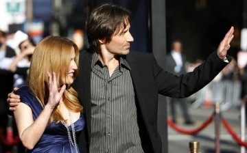 Cast members David Duchovny (R) and Gillian Anderson at the movie premiere of 