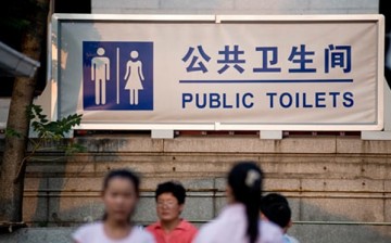 A public toilet sign in Beijing. China's public toilets are notorious for being unsanitary.