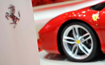 A Ferrari logo is displayed at the Geneva International Motor Show on March 2, 2015 in Geneva, Switzerland. 