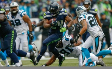 Seattle Seahawks running back Marshawn Lynch (#24) rushes against the Carolina Panthers in their Week 6 match.