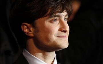 Daniel Radcliffe is seen posing as he arrives for the world premiere of ''Harry Potter and the Deathly Hallows: Part 1'' at Leicester Square in London