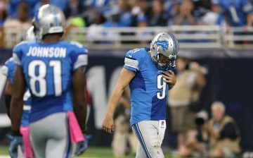 Detroit Lions quarterback Matthew Stafford (#9) and wide receiver Calvin Johnson (#81).