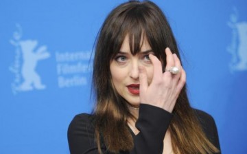Actress Dakota Johnson arrives for the screening of the movie 'Fifty Shades of Grey' at the 65th Berlinale International Film Festival in Berlin 