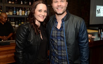 Actors Courtenay Taylor (L) and Scott Porter attend the Batman: Arkham Knight VIP Launch at The Line Hotel on June 22, 2015 in Los Angeles, California.