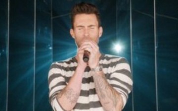 Adam Levine, Maroon 5 frontman, gives his all singing.
