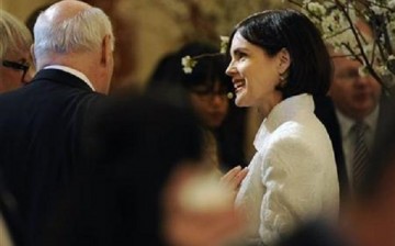 Elizabeth McGovern attends a luncheon for Britain's Prime Minister David Cameron at the State Department in Washington.