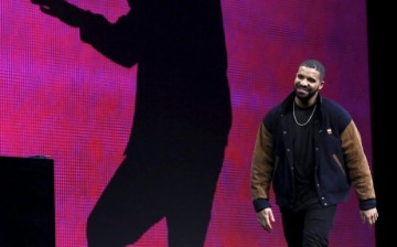 Musician Drake leaves the stage at the Worldwide Developers Conference in San Francisco, California June