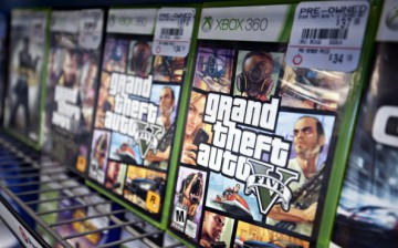 Copies of Take-Two Interactive Software Inc. 'Grand Theft Auto V' for the Microsoft Corp. Xbox 360 game system sit on display for sale at a GameStop Corp. store in Peru, Illinois, U.S., on Wednesday, March 26, 2014.