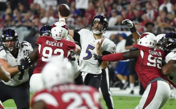 Baltimore Ravens quarterback Joe Flacco (#5) throws against the Arizona Cardinals.