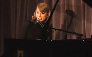 Taylor Swift celebrates one year anniversary of her album '1989' with the launch of the acoustic version of her number 'Out of The Woods'