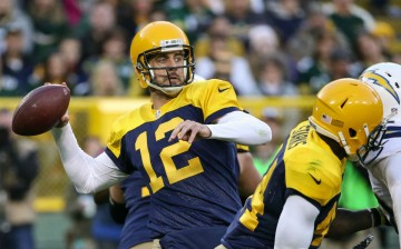 Green Bay Packers quarterback Aaron Rodgers (#12).