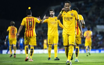 Barcelona's Luis Suárez (#9) and Neymar (R) scored the team's goals against Getafe.
