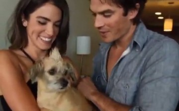 Ian Somerhlder and wife Nikki Reed with a furbaby; the couple believes cruelty to animals is unacceptable. 